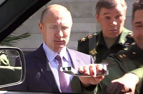 Оросын цэргийн техник нь Путины нүүрийг улалзуулав
